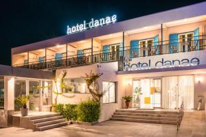 a hotel dmg with stairs outside at night at Danae Hotel in Egina