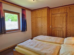 Posteľ alebo postele v izbe v ubytovaní Alpenpension Gastein