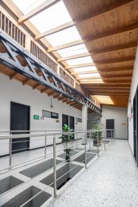 an empty building with a ceiling with skylights at Mándala Botero Medellín in Medellín