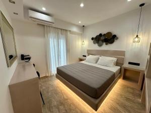 Voodi või voodid majutusasutuse Aphrodite Hotel & Apartments toas