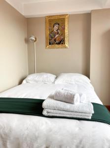 Letto o letti in una camera di Hotel Joram