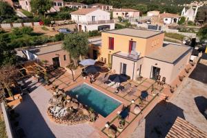 an aerial view of a house with a swimming pool at A CASA DI JO in Calenzana