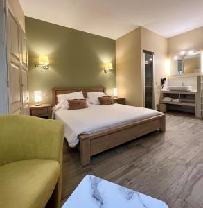 Colomba Hôtel Centre-Ville Historique客房内的一张或多张床位