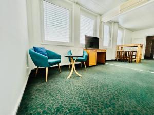 TV a/nebo společenská místnost v ubytování Kobra Room für 4 Personen