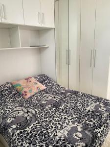Postel nebo postele na pokoji v ubytování Casa da Jô