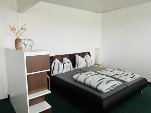Postel nebo postele na pokoji v ubytování Kobra Room für 4 Personen