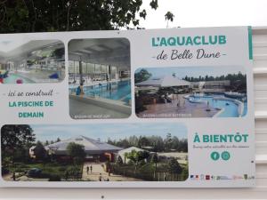 ein Schild für einen Pool in einem Resort in der Unterkunft BELLE DUNE Village Vacances face à l'Aquaclub de FORT MAHON in Fort-Mahon-Plage