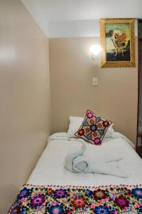 Letto o letti in una camera di Hotel Joram