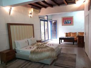 Postel nebo postele na pokoji v ubytování Auberge kasbah tifirte