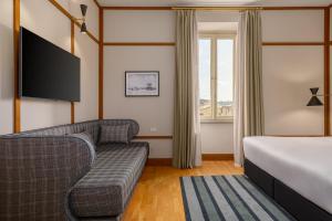 Cama ou camas em um quarto em Room Mate Luca, Florence