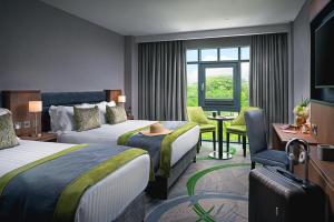 Cama ou camas em um quarto em Carlton Hotel Dublin Airport
