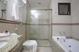 Ванная комната в Castelo Inn Hotel