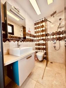 a bathroom with a sink and a shower at Villa Bella in Kusadası +33 photos