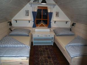 Letto o letti in una camera di Chalupa Modré Nebe