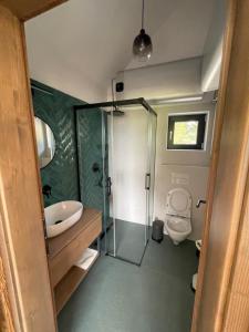 Koupelna v ubytování Kaliba Cabins