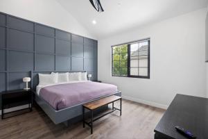 a bedroom with a large bed and a window at Sand Hollow Haven in Hurricane +47 photos