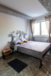 Katil atau katil-katil dalam bilik di Apartman Despot LUX