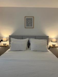 Ένα ή περισσότερα κρεβάτια σε δωμάτιο στο AAA SEAVIEW APARTMENTS - Makarska