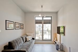 Telewizja i/lub zestaw kina domowego w obiekcie Wygodny apartament w Pucku