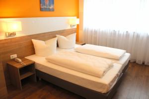 Postel nebo postele na pokoji v ubytování Hotel S16