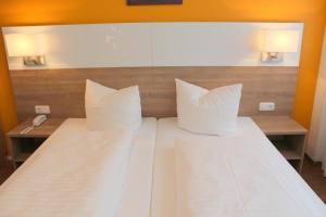 Postel nebo postele na pokoji v ubytování Hotel S16
