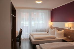 Postel nebo postele na pokoji v ubytování Hotel S16