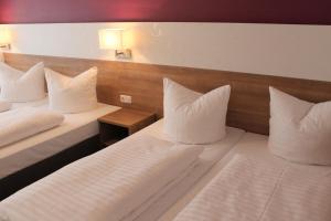 Postel nebo postele na pokoji v ubytování Hotel S16