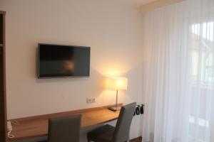 TV a/nebo společenská místnost v ubytování Hotel S16