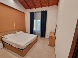 Postel nebo postele na pokoji v ubytování Appartamento Ombra