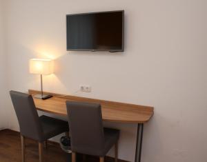 TV a/nebo společenská místnost v ubytování Hotel S16