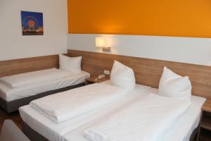 Postel nebo postele na pokoji v ubytování Hotel S16