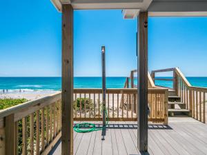 a porch with a view of the beach at Lungomare in Surf City +49 photos