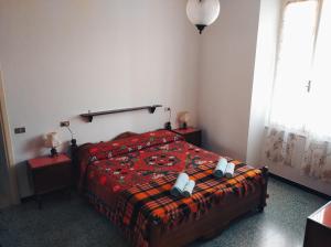 Ліжко або ліжка в номері Albergo Belvedere