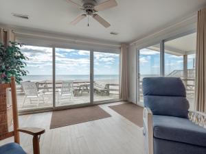 a living room with a view of the ocean at Mamaws Spot in Hampstead