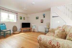 TV a/nebo společenská místnost v ubytování Bolitho's Retreat