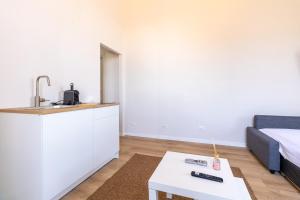Kuchyň nebo kuchyňský kout v ubytování Joe Litty Rooms