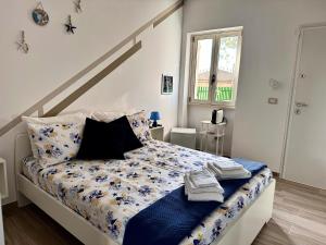 Postel nebo postele na pokoji v ubytování Elegant Dei Rooms