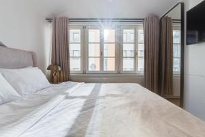 Postel nebo postele na pokoji v ubytování Atik Hotel Vienna