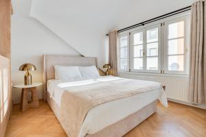 Postel nebo postele na pokoji v ubytování Atik Hotel Vienna