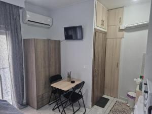 TV a/nebo společenská místnost v ubytování Studio Anna