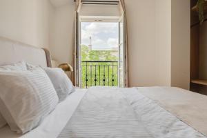 Postel nebo postele na pokoji v ubytování Atik Hotel Vienna