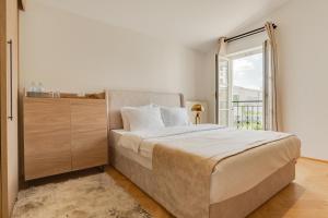 Postel nebo postele na pokoji v ubytování Atik Hotel Vienna
