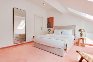 Postel nebo postele na pokoji v ubytování Atik Hotel Vienna