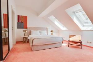 Postel nebo postele na pokoji v ubytování Atik Hotel Vienna