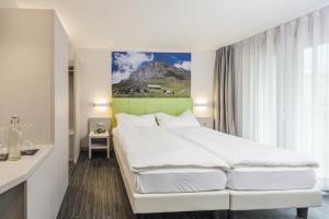 Krevet ili kreveti u jedinici u okviru objekta Adhhoc Hotel