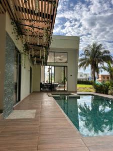 Hồ bơi trong/gần Hermosa casa vacacional en Condominio campestre con baño turco