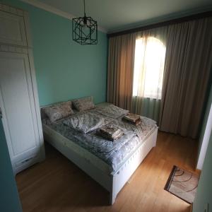 Postel nebo postele na pokoji v ubytování Alpha Rest House