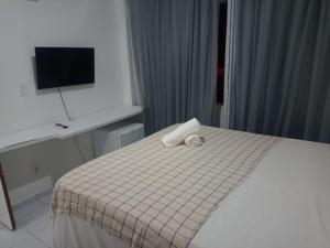 Postel nebo postele na pokoji v ubytování Pousada Mar de Maceió