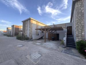 a building with awning on the side of it at Romantic Cozy Studio Bali Gouna in Hurghada