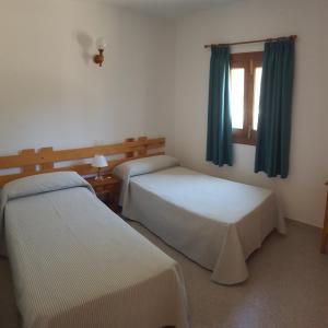 Postel nebo postele na pokoji v ubytování Can Pep Lluquinet